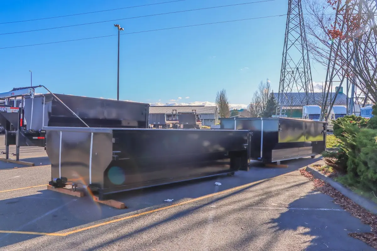 Roll-off dumpster ready for waste disposal at job site for 2 Yard Dumpster Rental in Orange Cove